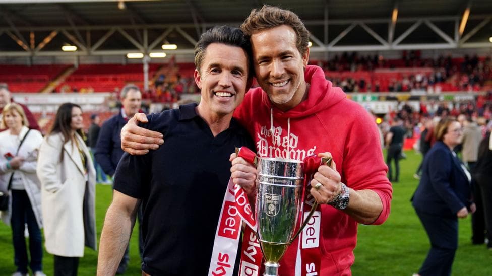 Wrexham owners Reynolds and Mac buy football pub