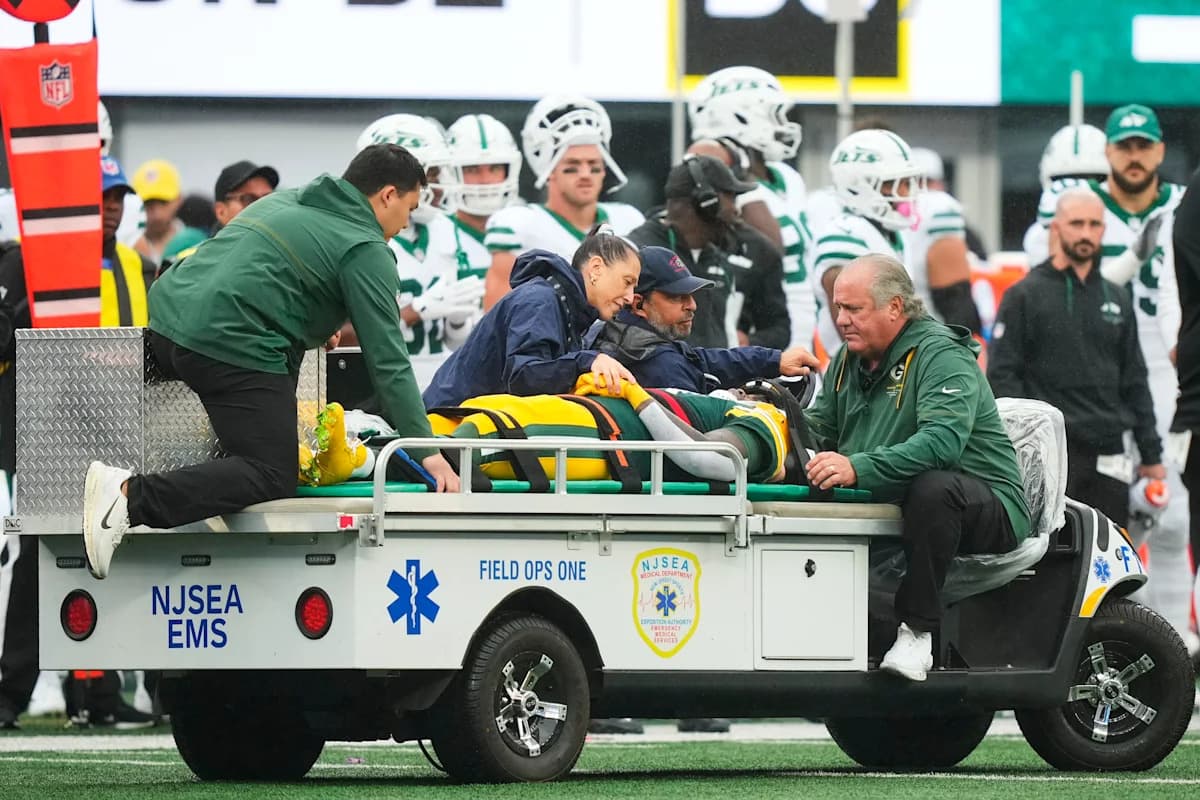 Packers WR Jayden Reed leaves field on backboard with his neck stabilized after contact to head on tackle