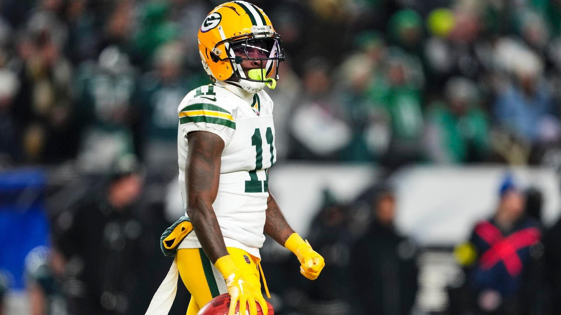 
                        Packers' Jayden Reed carted off after taking hit vs. Jets, ruled out
                    
