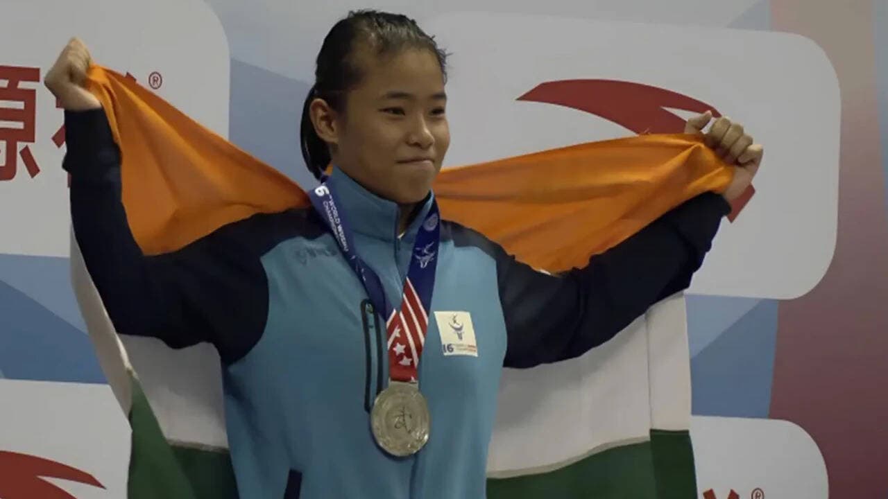 Roshibina Devi assures medal after second chance, one win away from Asian Games final